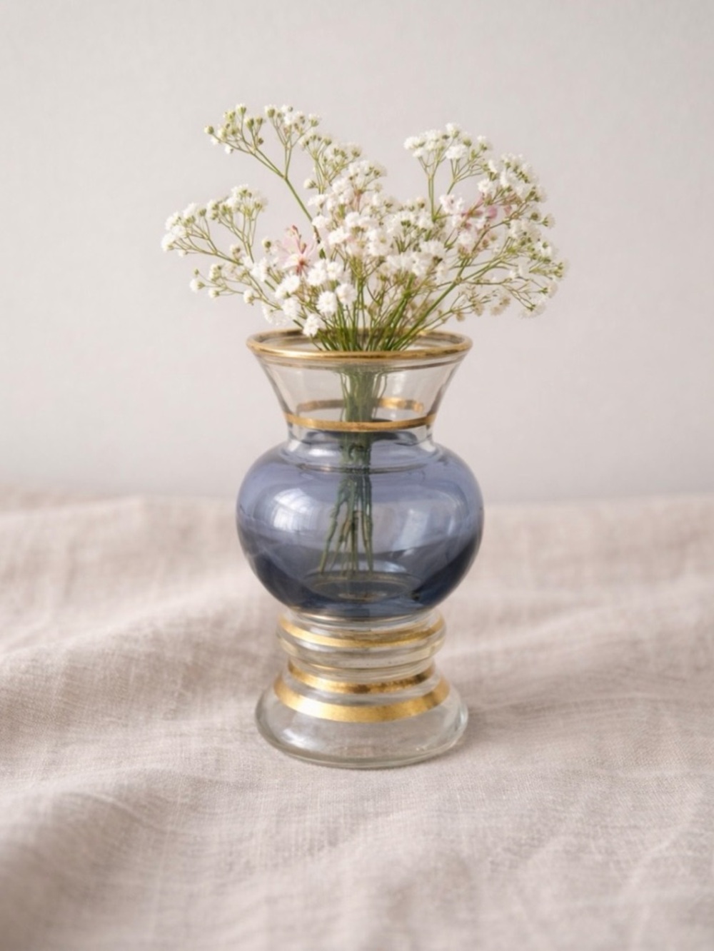 Small Vintage Bartlett Collins Alexandrite glass bud vase with gold gilt bands.